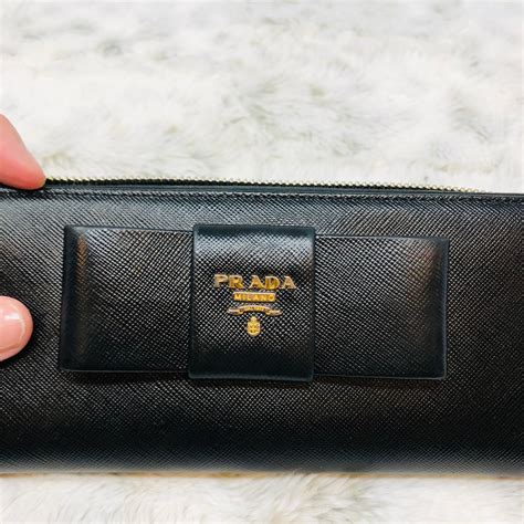 prada zip wallet grey|Prada wallet price list.